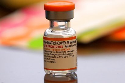 A vial of the Pfizer-BioNTech COVID-19 vaccine for children 5 to 12 years old sits ready for use at a vaccination site in Fort Worth, Texas, Thursday, Nov. 11, 2021. (AP Photo/LM Otero)